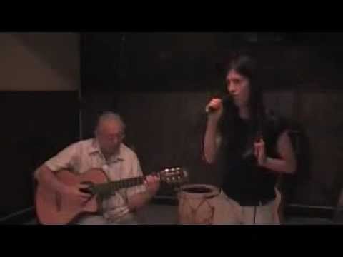 Tango "Una rosa y un farol". Canta: Gisela Orcellet, acompañada por el maestro Antonio Del Río.