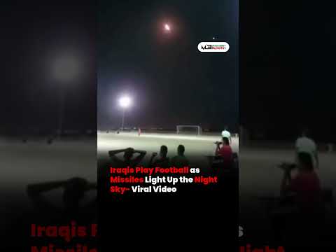 Iraqis Continue Playing Football as Missiles Light Up the Night Sky