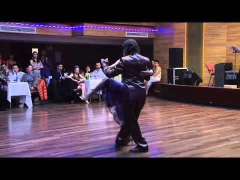  Lily Cheng  and  Raymond Chu  are  dancing  to  a  tango  at  Shanghai Tango Marathon  in  2014