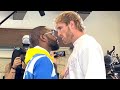 FLOYD MAYWEATHER STEPS TO LOGAN PAUL DURING FACE TO FACE AT FINAL PRESS CONFERENCE