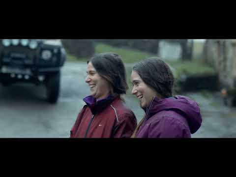 Official Focus Features trailer frame for Brian and Charles showing Brian with his homemade robot Charles in rural Wales