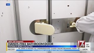 Hands-free plane bathroom door
