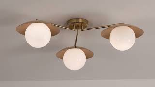 Watch A Video About the Possini Euro Casoria Brass Gold Opal 3 Light Ceiling Light