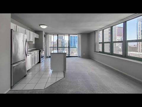 A River North carpeted 1-bedroom #1015 at One Superior Place