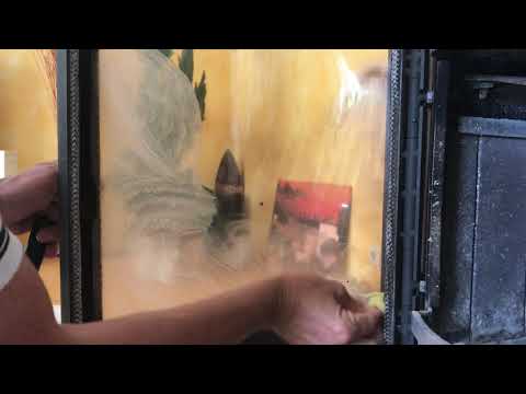 Perlglanz24  mit Perlglanz Spezial Hochleistungs Putzstein die Kaminofenscheibe reinigen