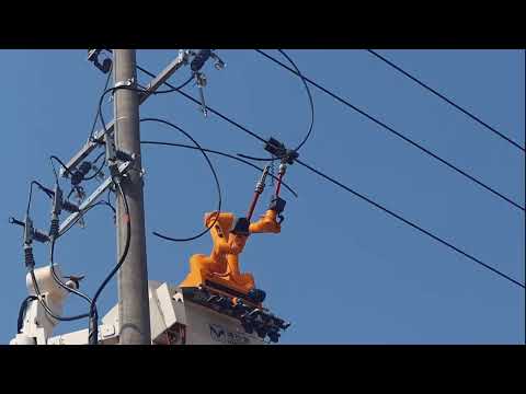 The robot connects power cable under 10kv high Voltage Live-line in Shanghai China.
