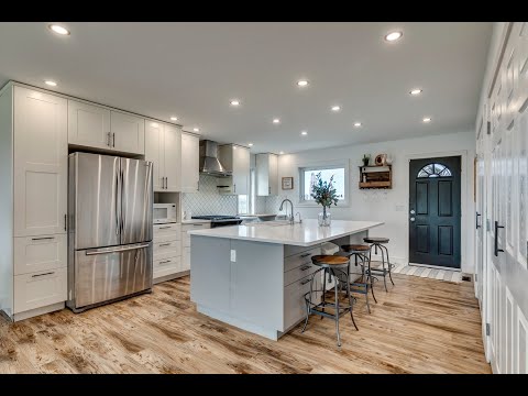 Calgary Area Fully Renovated Acreage for $1,049,000