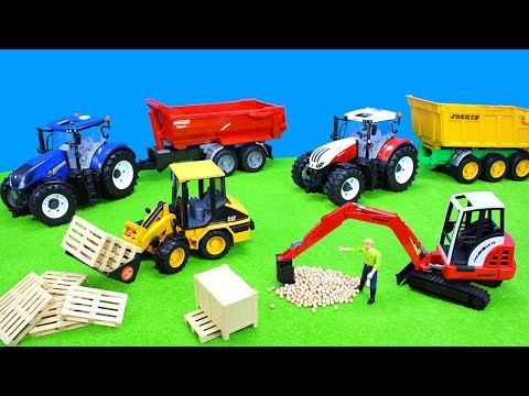 Farmer Spielzeuge von Bruder auspacken u. beim Spielen die Funktionen zeigen. Wir fahren den Traktor