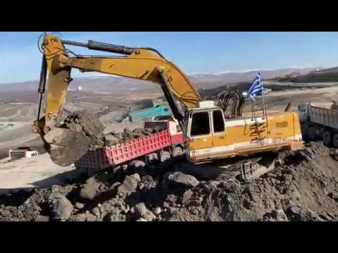 Liebherr 974 Excavator Loading Trucks