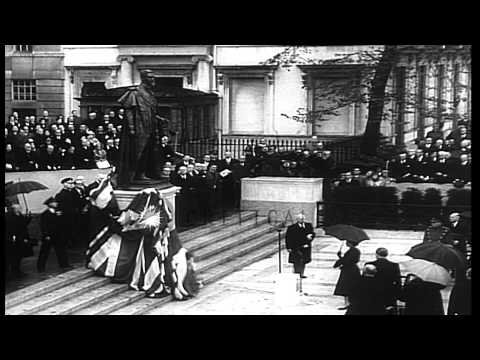 Queen Elizabeth of England unveils the National Memorial Statue of her father, Ki...HD Stock Footage