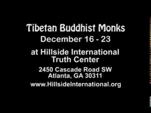 TIBETAN MONKS AT HILLSIDE