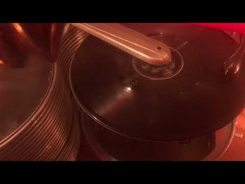 Vintage jukebox plays Sea Of Love on an original 78rpm record