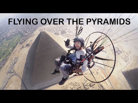 Flying Over The Great Giza Pyramids, Egypt With A Paramotor.