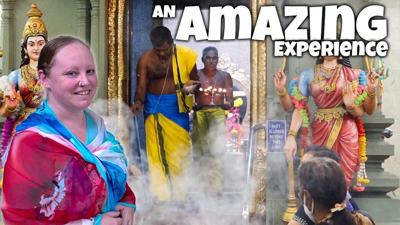 A duo embarks on a captivating visit of Sri Mahamariamman Temple.