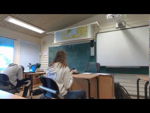 Kid slaps her head in the desk