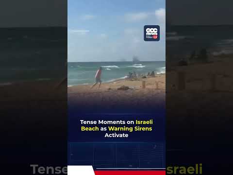 Panic on Israel Beach as Sirens Sound During Reported Hezbollah Rocket Attack