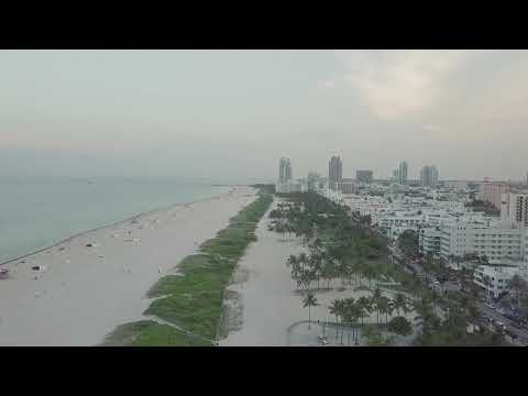 Aerial Footage OF The Beach Beside The City