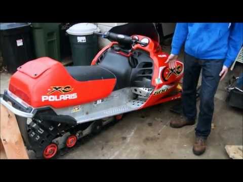 how to change a track on a snowmobile