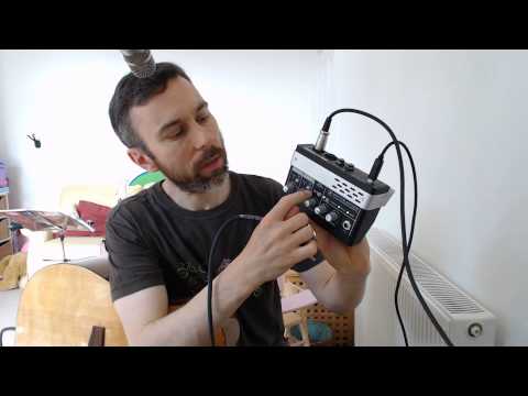 An Electro-Acoustic Guitar plugged in to a Mackie Onyx Blackjack Recording Interface