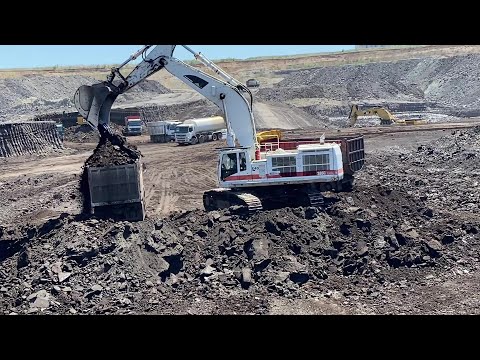 Caterpillar 385C Excavator Loading Trucks & Caterpillar D6R Cleans The Loading Area - Interkat SA