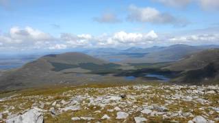 preview picture of video 'View North from Curraune Hill ; clouds' shadows moving across landscape'