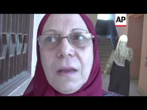 Egyptians vote on Islamist-backed constitution
