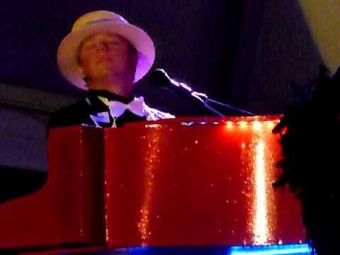 Rus Anderson sings " The Rocket Man " at Treasure Island Beach