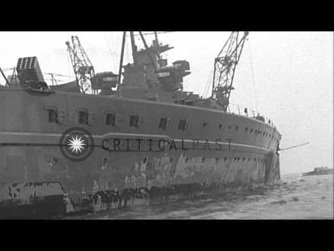 Views from small boat circling HMS King George V, anchored in Halifax Harbor. A m...HD Stock Footage