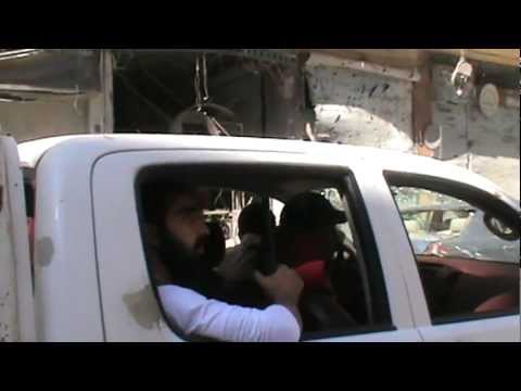 تجهيزات عناصر كتيبة صقور حمص للتوجه للمؤازرة في حي جورة الشياح في مدينة حمص