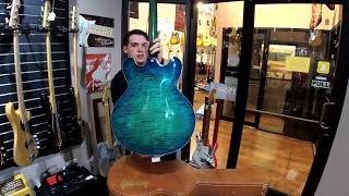 Video thumbnail for Live unboxing of the 2018 Gibson ES-335 figured top in Aquamarine by napervillemusic