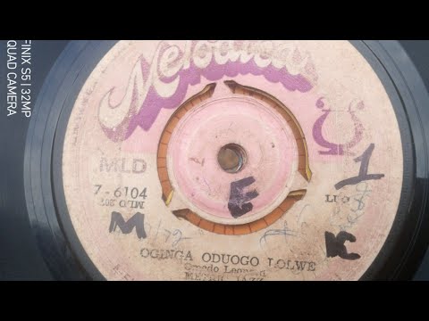 OGINGA  ODUOGO LOLWE.METRIC JAZZ BAND.BY LEONARD OMEDO.MELODICA 104 SIDE A.