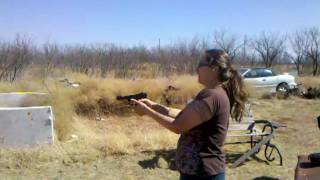 preview picture of video 'Jennifer firing the Ruger 22/45'