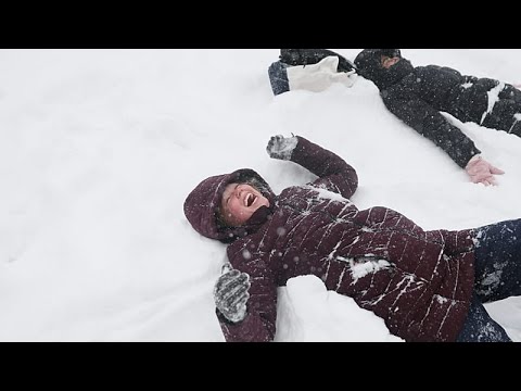 New Yorkers revel in snowball fight amid major winter storm