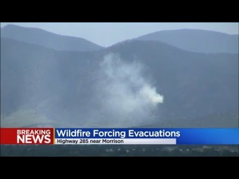 Wildfire forces evacuations near Highway 285 in Morrison area