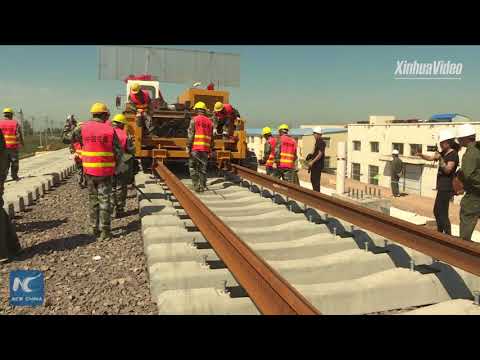 Watch how tracks are laid for China's high-speed rail