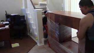 how to move a heavy entertainment center upstairs by Rescue Moving Services
