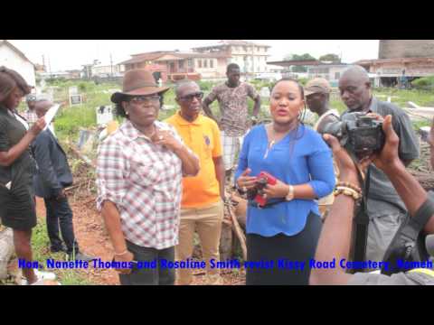 Hon. Nanette Thomas engages the Chief Cemetery Keeper of Kissy Road