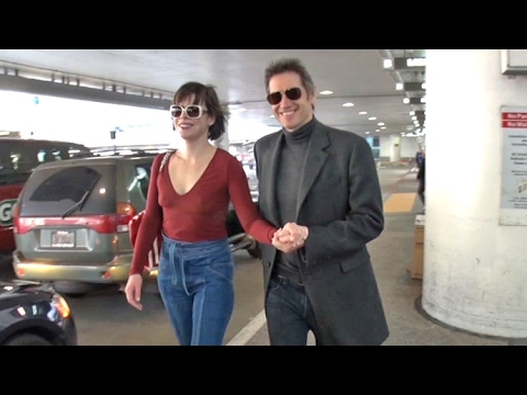 Milla Jovovich And Paul W. S. Anderson Look So In Love At LAX