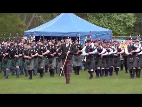 Massed Pipe Bands Salute Chieftain during finale of 2019 North of Scotland Pipe Band Championship