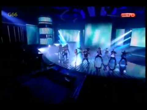 Ashley dancing behing Kelly Rowland in Down For Whatever(X Factor UK 2011)