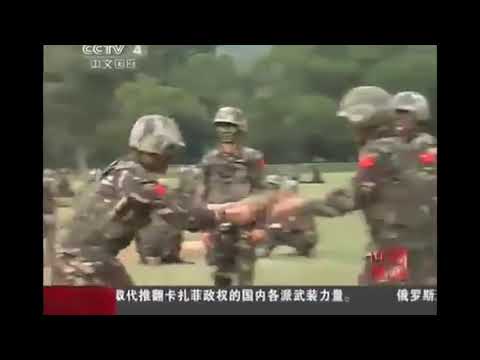 Chinese soldiers pass around live grenade   Hot potato
