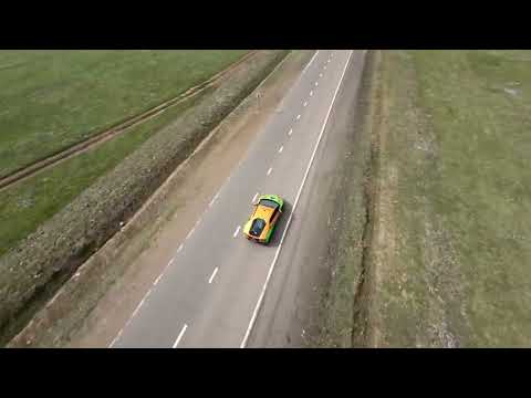 FPV Drone Drag Racing with Lambo & Camaro