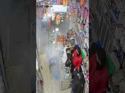 Moment Israeli soldier throws stun grenade at shop near Ramallah