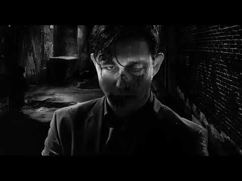 Sin City: A Dame to Kill For trailer frame with rain-slick Basin City street and neon reflections