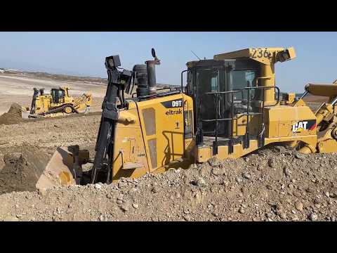 Caterpillar D9T Bulldozers Shaping An Old Mining Site (Reclamation Works)