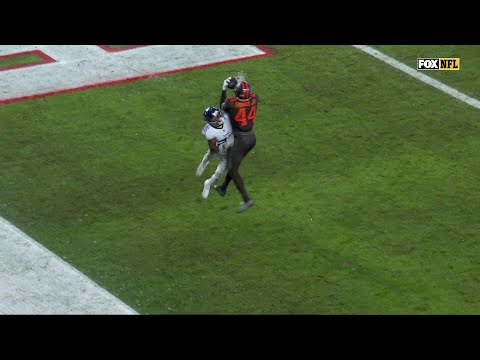 Harold Fannin mosses the defender for the touchdown