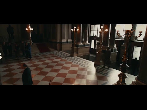 Trailer close-up: Serena in period dress, eyes fixed, storm behind them