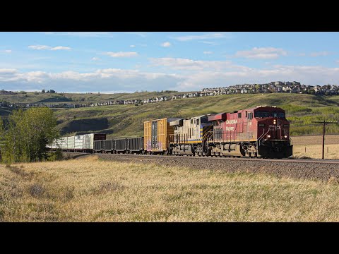EX CITIRAIL UNIT!!!! CP 8861, CN 3987 and CP 8140 lead CP 9-400 east near Cochrane, Alberta!
