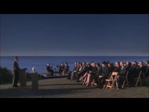 Trailer still: green hearse rolling through Los Angeles as Thomas Newman’s theme swells