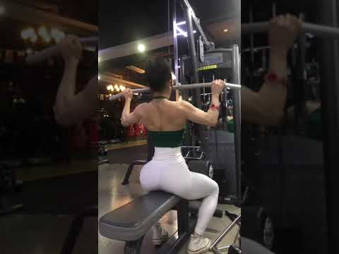 Chinese Muscle girl Showing her Muscle